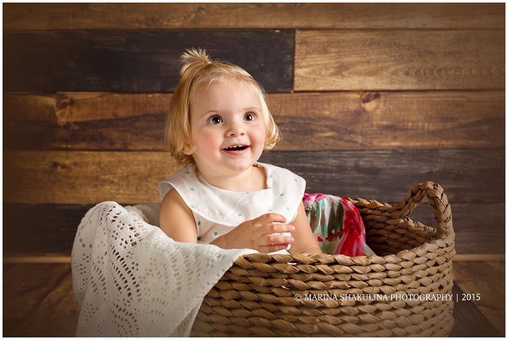 Fotografo di Bambini a Pescantina - bambina nella cesta