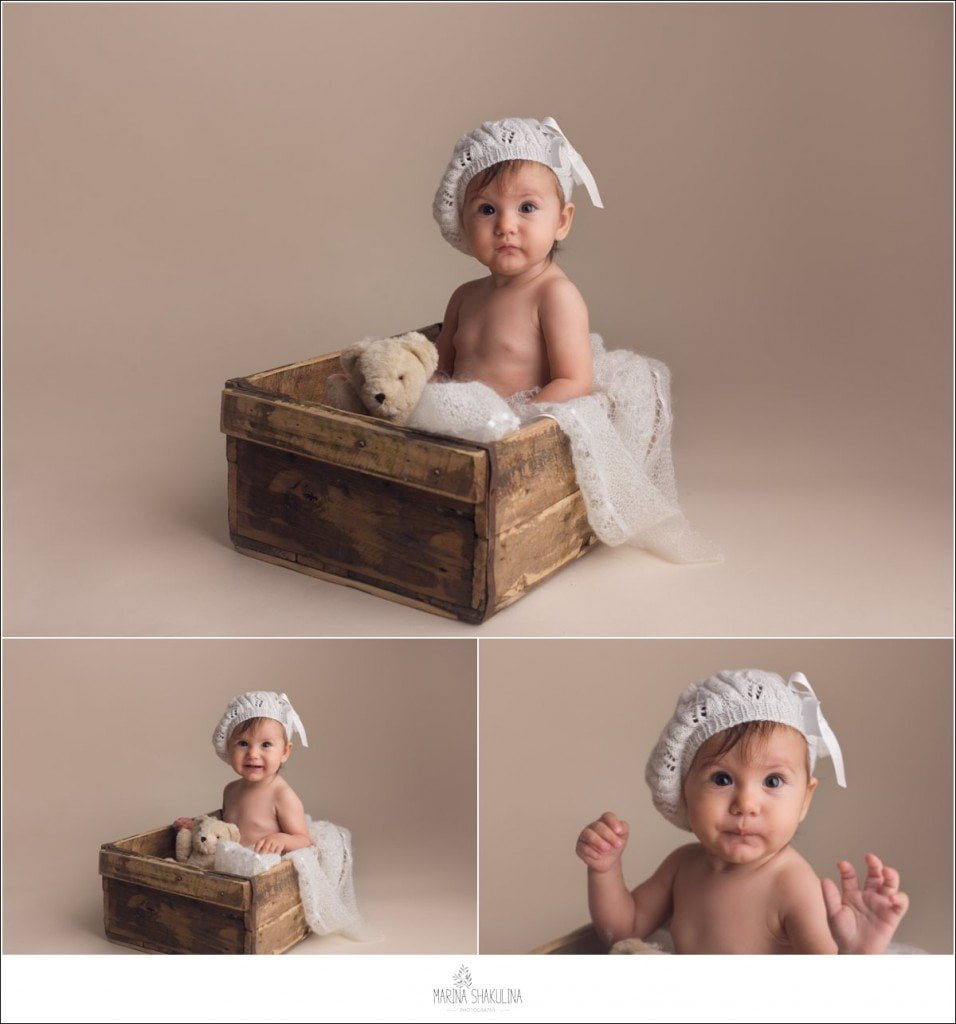 Servizio fotografico bambini a Verona - bambina in box in legno